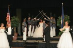 Debutantes appeared through a sword arch of Fishburne cadets.