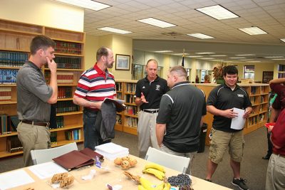 New Faculty members at Fishburne Military School meet with veteran FMS instructors to discuss strategies