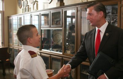 Kurt Cook '87 talks with Cadet following Fishburne Military School Blessing of the Colors