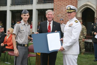 Delegate Steve Landes presents Fishburne Military school with a joint house resolution honoring JB Yount III (Fishburne Class of 1956)